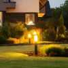 Beautiful backyard transformation by the Best Landscaping Services in Macomb with lush green lawn and elegant garden design