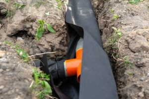 Professional French drain installation by Tatrabuilt in a residential yard