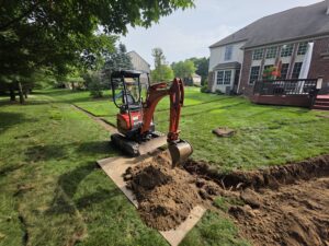 excavator-french-drain-trenching-macomb-county-tatrabuilt